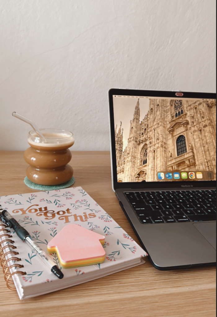 computer with coffee mug, working remote 